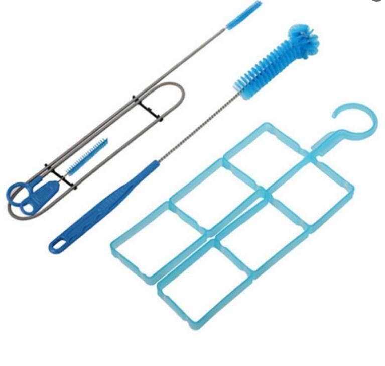 Cleaning a hydration bladder with brush and cleaning tablets