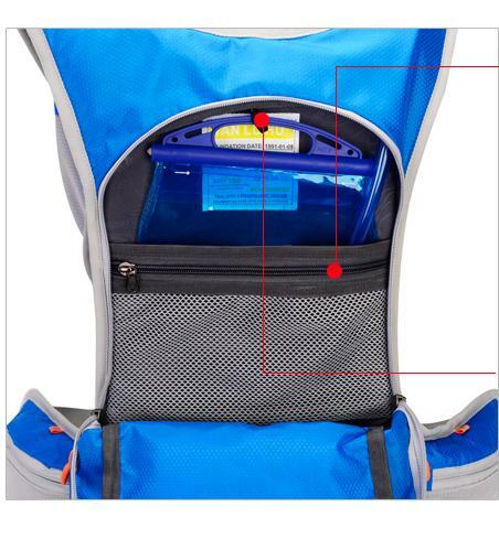 Hydration bladder being inserted into hiking backpack sleeve